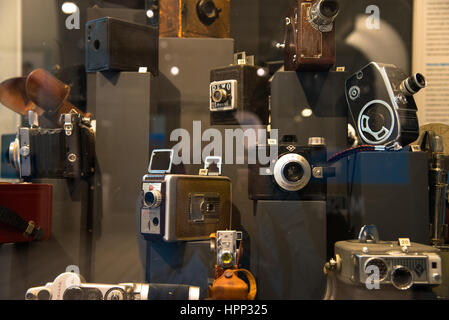 set of old fashioned photo cameras at museum Stock Photo