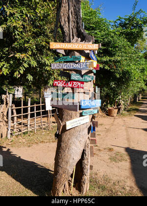 Signpost with wooden signs in many colors Stock Photo