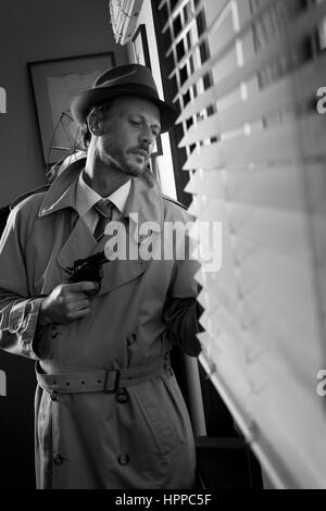 Attractive spy agent peeking from an office window, film noir. Stock Photo