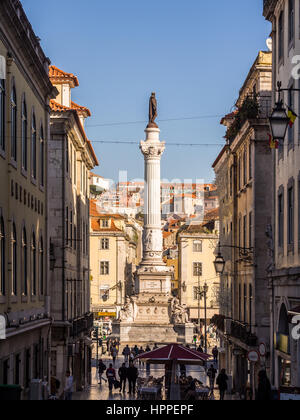 vertLISBON, PORTUGAL - JANUARY 10, 2017: Column of Pedro IV on Rossio Square (Pedro IV Square) in Lisbon, Portugal, seen from Calcada do Carmo street. Stock Photo