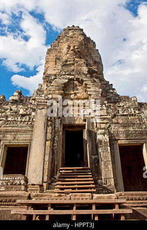 The Bayon (Prasat Bayon) is a well-known and richly decorated Khmer temple at Angkor Thom in Cambodia. It was the last state temple to be built at Ang Stock Photo