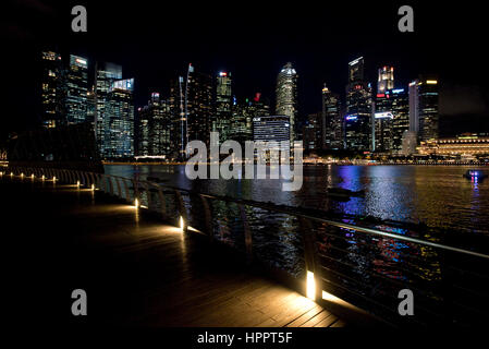 A cityscape view at night of the tower blocks and skyscrapers of the Central Business District (CBD) or Central Area in Singapore. Stock Photo