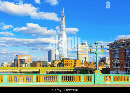 LONDON - JULY 06, 2016: The shard building is a famous landmark in London's financial district. This photograph was taken from Southwark bridge which  Stock Photo
