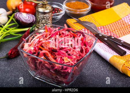 Fresh vegetables, cut into strips, in glass bowl. Studio Photo Stock Photo