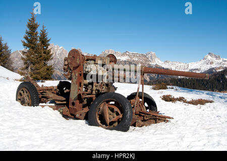 Cannon of the First World War abandoned on the war zone over the Dolomites, near Alleghe (Italy) Stock Photo