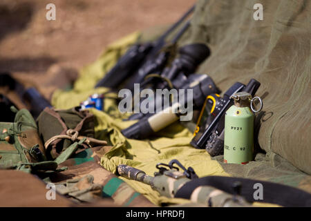 Anti-poaching patrols use a variety of specialized equipment for overnight missions in Kruger National Park South Africa to catch rhino poachers. Stock Photo