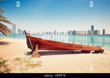 Traditional arabian boat on the beach in Abu Dhabi - United Arab Emirates Stock Photo
