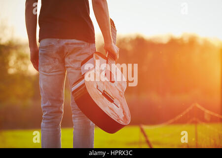 Handsome young man is enjoying in springtime Stock Photo