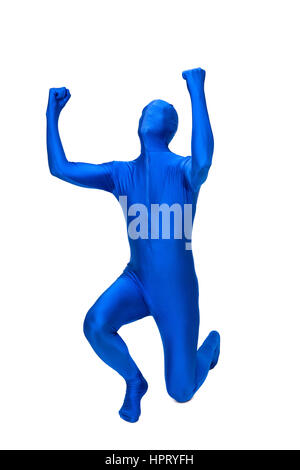 Mysterious blue man in morphsuit rejoice Stock Photo