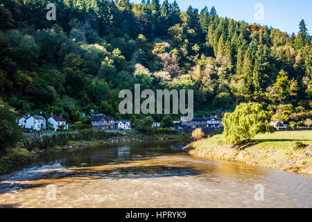 The river Wye flowing past the village of Tintern in Monmouthshire, Wales. Stock Photo