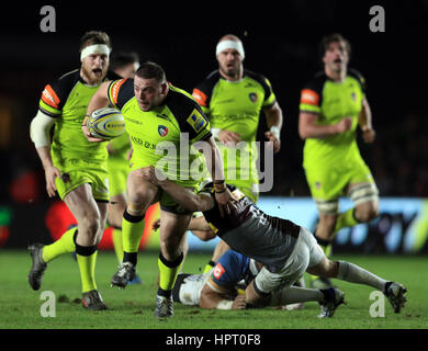 Harlequins' Charlie Mulchrone stops Leicester's Greg Bateman during the Aviva Premiership match at Twickenham Stoop, London. Stock Photo