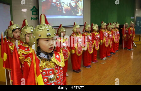 February 13, 2017 - Hefei, Hefei, China - Hefei, CHINA-February 13 2017: (EDITORIAL USE ONLY. CHINA OUT) ..Students wearing traditional Chinese clothes recite Chinese poetry in class at a primary school in Hefei, east China's Anhui Province, February 13th, 2017, marking the start of a new semester. (Credit Image: © SIPA Asia via ZUMA Wire) Stock Photo