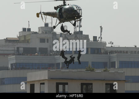 Kathmandu, Nepal. 24th Feb, 2017. Nepalese Army Soldiers fast rope from a chopper to rescue hostages during Army Day celebrated annually on the day of Maha Shivaratri festival in Kathmandu, Nepal on Friday, February 24, 2017. Credit: Skanda Gautam/ZUMA Wire/Alamy Live News Stock Photo