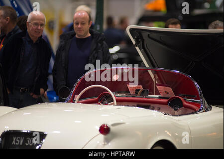 ExCel, London, UK. 24th February, 2017. Second day of the 2017 Classic Car Show and visitors fill the halls for the first full day to study luxury supercars and classics up close. Credit: Malcolm Park editorial/Alamy Live News. Stock Photo