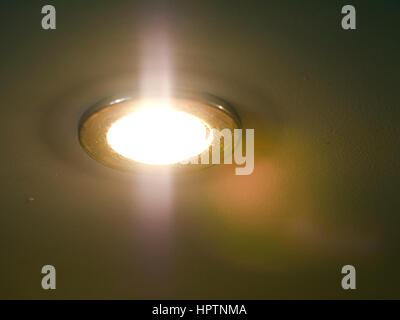 The luminous spot lamp on the ceiling Stock Photo