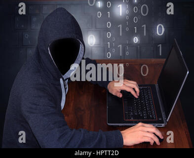 hacker with laptop Stock Photo