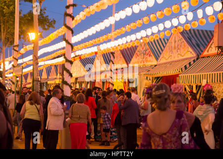 SEVILLE, SPAIN - APR, 25: people  celebrating at the Seville's April Fair on April, 25, 2014 in Seville, Spain Stock Photo