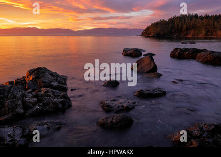 Sunrise at Aylard Farm beach-East Sooke Park, British Columbia, Canada. Stock Photo