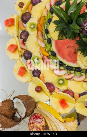 compositions of fresh fruit cut for buffets. typical summer fruits of Sicily, refreshing and healthy. Stock Photo