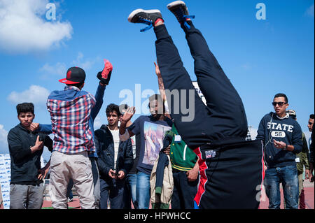 Libya, Tripoli: Young guys breakdance at an open air dance and parkour festival. Stock Photo