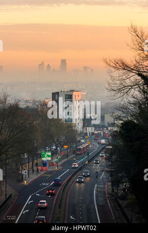 Orange sky at sunset looking south along Archway Road to the City of London, from Hornsey Lane Bridge, North Islington, London, UK Stock Photo