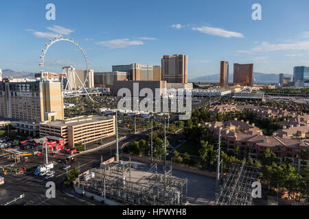 Las Vegas, Nevada, USA - June 10, 2015:  Clear desert morning view of resort towers and the High Roller ferris wheel. Stock Photo