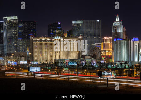 Editorial view of Las Vegas casino resorts and night traffic leading to the Las Vegas strip.