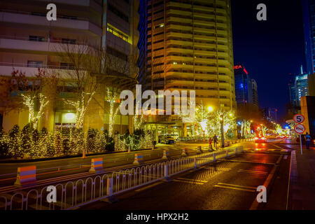 BEIJING, CHINA - 29 JANUARY, 2017: Metropolitan chinese capitol, large office buildings and charming street lights on a beautiful dark evening. Stock Photo