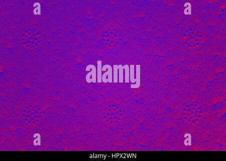 Color toned abstract background made of polystyrene foam. Stock Photo