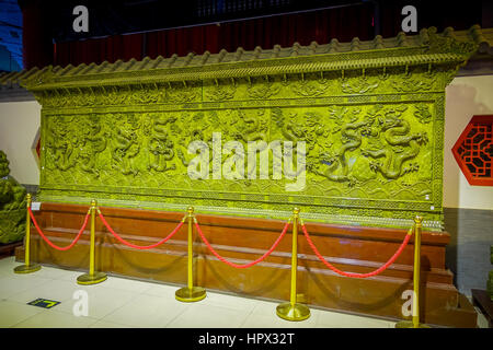 BEIJING, CHINA - 29 JANUARY, 2017: Large green metal plate with beautiful jade crafted pattern, spectacular piece of work, traditional chinese art. Stock Photo