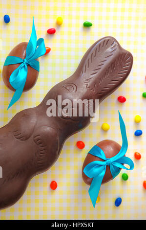 Milk chocolate Easter eggs and rabbit. festive composition Stock Photo