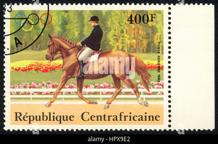 A postage stamp printed in  Central African Republic  shows a  Dressage, from series Equestrianism, circa 1983 Stock Photo