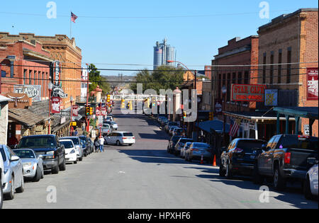 The main entrance and street sign leading to the historic Fort Worth Stork Yard district. Stock Photo