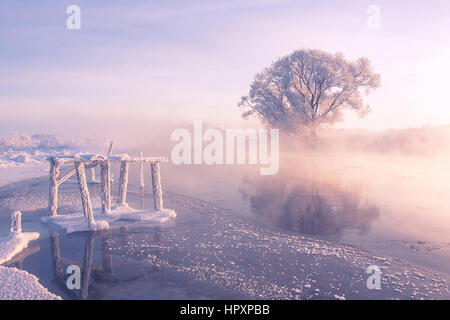 Colorful winter morning and river is about to get frozen Stock Photo