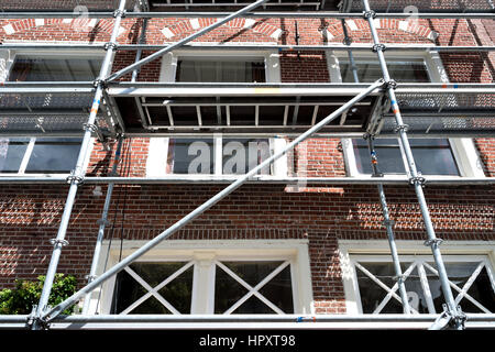 scaffolding at urban building currently under renovation Stock Photo