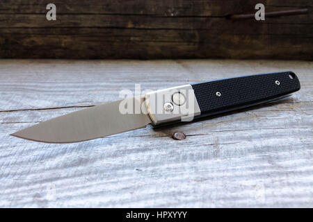 flick-knife-with-a-black-