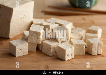Fresh cut pieces of raw tofu Stock Photo
