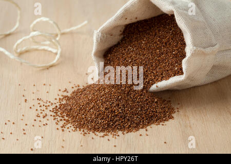 Little open linen pouch with teff seeds Stock Photo
