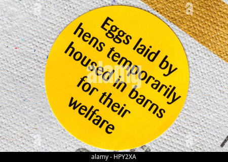 Eggs laid by hens temporarily housed in barns for their welfare sticker on egg carton for M&S mixed size eggs - temporary measure due to bird flu Stock Photo