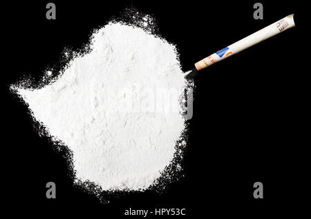 A powder drug like cocaine in the shape of Zimbabwe with a rolled money bill.(series) Stock Photo