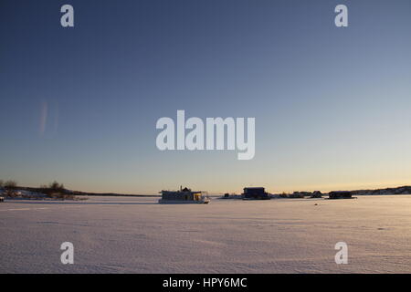 Houseboats on Yellowknife Bay in Great Slave Lake at sunset Stock Photo