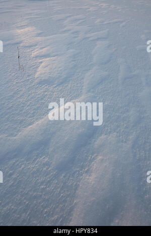Windblown snow patterns Stock Photo
