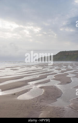 Cayton bay beach including Lebberston cliff near Scarborough, North Yorkshire, England. Stock Photo