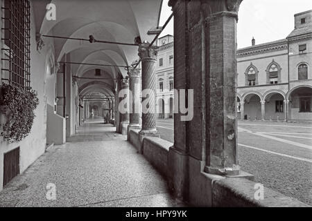 Bologna - The porticoes of Saint Stephen square or Piazza San Stefano in morning. Stock Photo