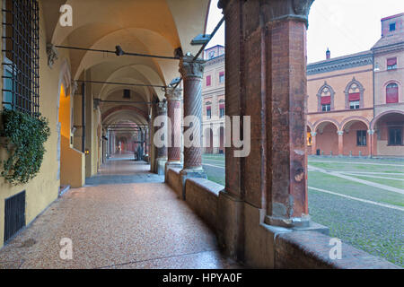 Bologna - The porticoes of Saint Stephen square or Piazza San Stefano in morning. Stock Photo