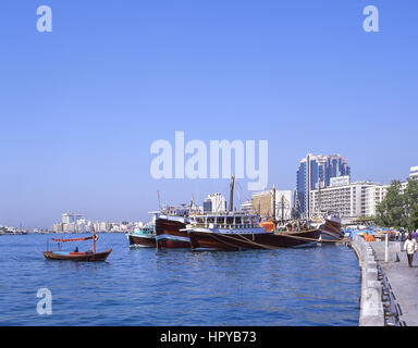 Dhow boats moored on quayside, Dubai Creek, Deira, Dubai, United Arab Emirates Stock Photo