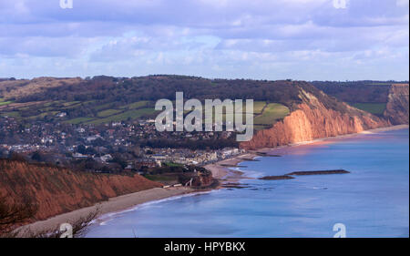 Overhead aerial view of Sidmouth Devon  from South West Coastal Path at High Peak, above the Regency town, red sandstone cliffs dominate the landscape Stock Photo