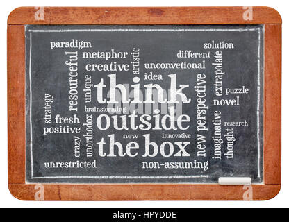 Think outside the box word cloud - word abstract on a slate blackboard with white chalk Stock Photo