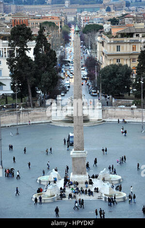 ROME, ITALY - MARCH 14, 2016: Tourists visiting the Piazza del Popolo in Rome, one of major squares of the city Stock Photo