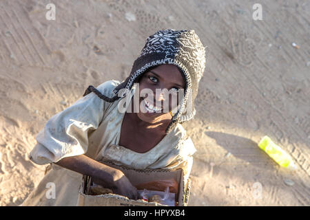 Khartoum, Sudan - Dec 19, 2015: Young Sudanese boy posing on a market. Stock Photo